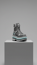 Celeste Float platform boot with silver accents, Single boot or pair shot at a slight 3/4 angle (not flat), elevated on a...